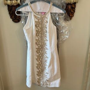 Lilly Pulitzer size 00 dress lined cream and gold. Runs small.